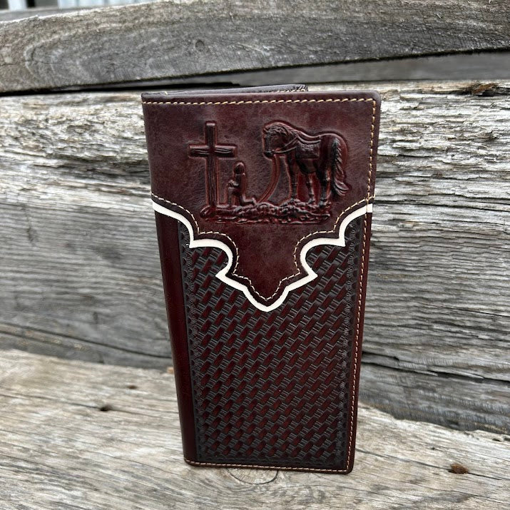 Coffee Brown leather wallet with embossed design on a wooden surface