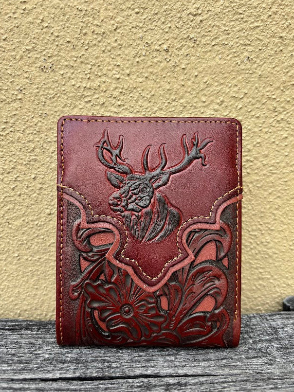 A brown bifold wallet featuring a embossed buck design with brown inlay. Front View