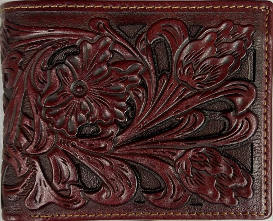 Brown leather wallet with intricate floral embossing
