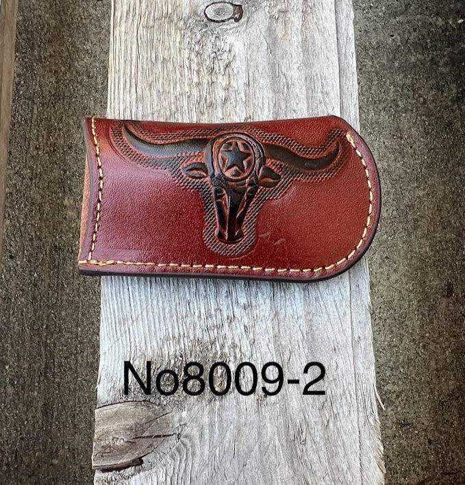 This Brown leather knife sheath from Top Notch Accessories features an embossed Longhorn with Star design. Front View