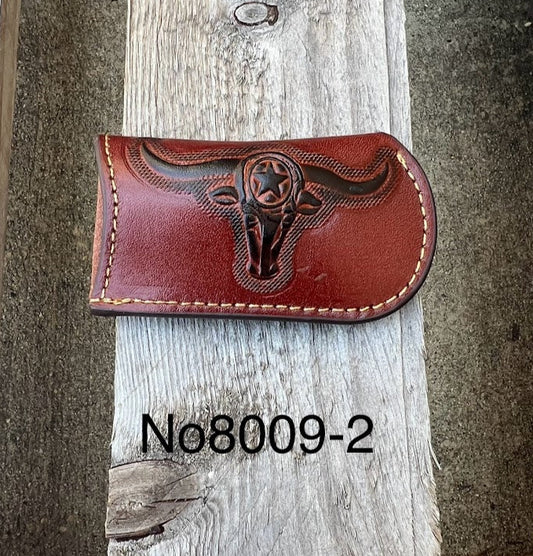 This Brown leather knife sheath from Top Notch Accessories features an embossed Longhorn with Star design. Front View