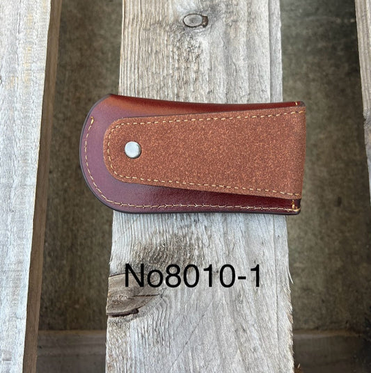 This Brown leather knife sheath from Top Notch Accessories features a embossed Praying Cowboy design and a leather belt attachment. Rear View