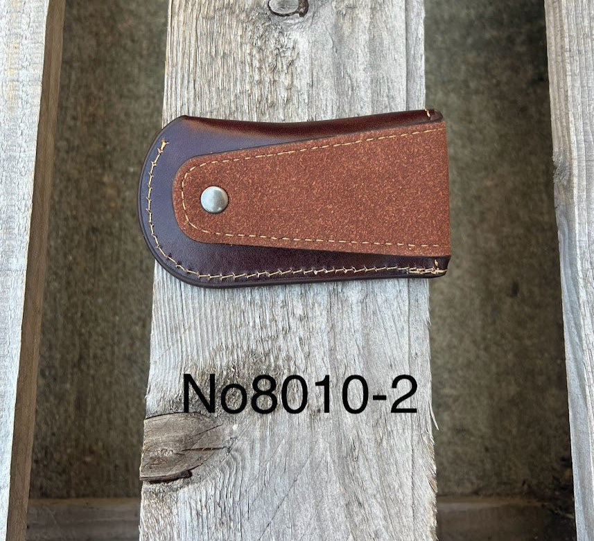 This Coffee Brown leather knife sheath features a embossed Praying Cowboy design. Rear view showing leather belt attachment. 