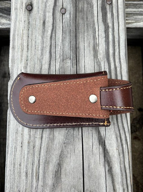 This Coffee Brown leather knife sheath from Top Notch Accessories features a embossed Longhorn design with a Star. Rear view showing the leather belt loop attachment.