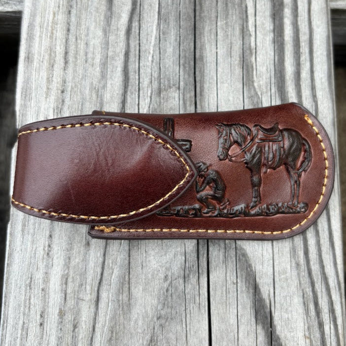 Coffee Brown leather knife sheath with a Praying Cowboy design and a keep. Front View