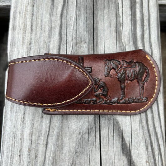 Coffee Brown leather knife sheath with a Praying Cowboy design and a keep. Front View