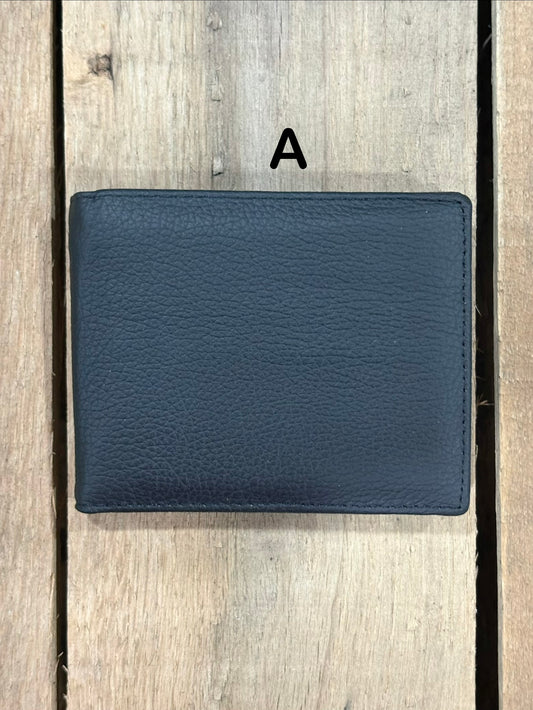 Black smooth leather wallet on a wooden surface
