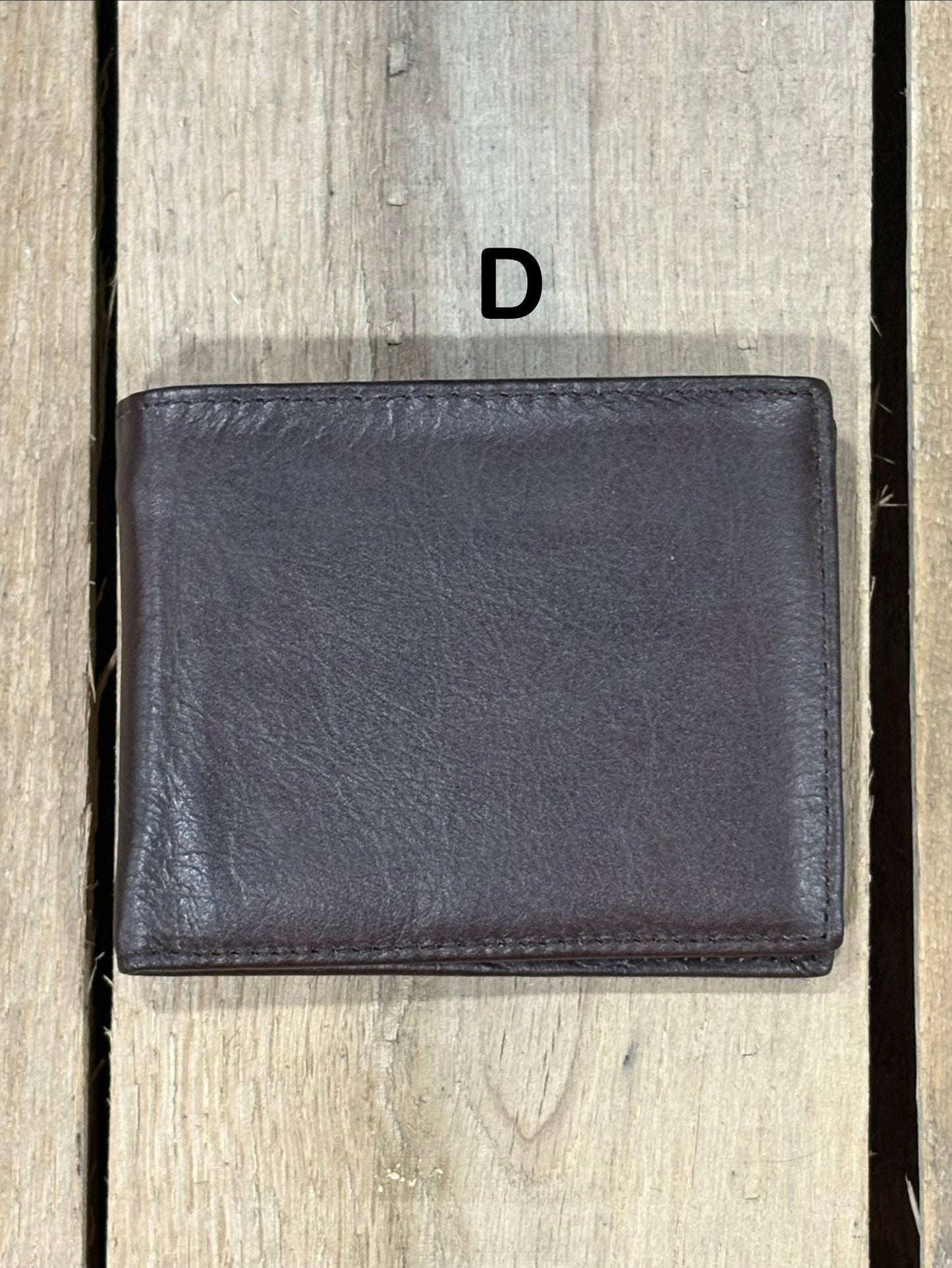Dark Brown smooth leather wallet on a wooden surface