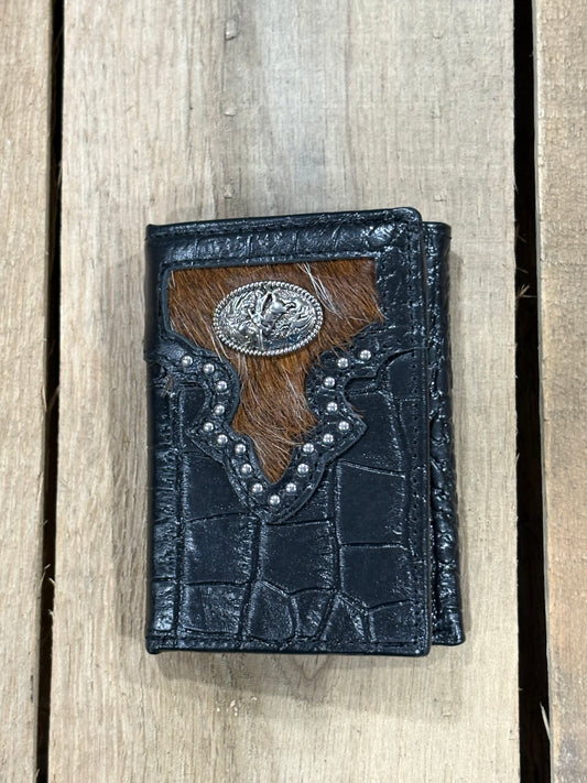 Black leather alligator print wallet with hairon cowhide and silver Bull Rider concho on a wooden surface