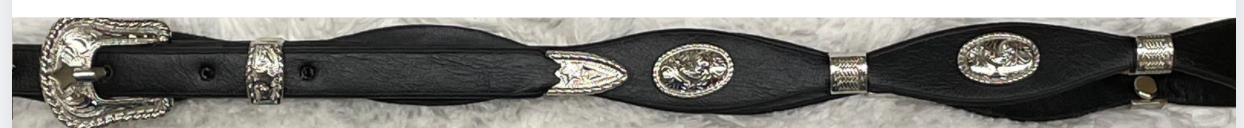 Decorative black leather hat band and silver buckle set and conchos on a white background