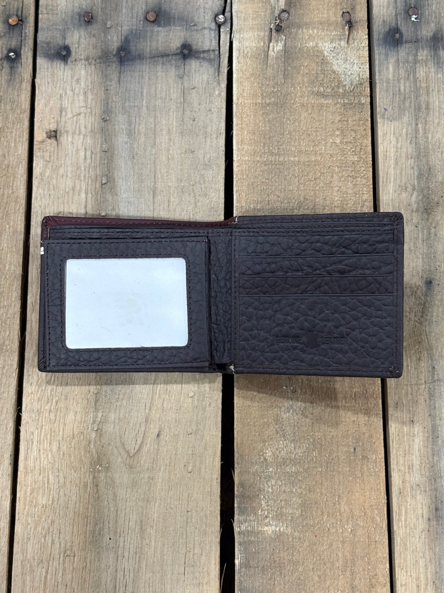 Coffee Brown leather wallet with a ID window slot and 3 card slots on a wooden surface