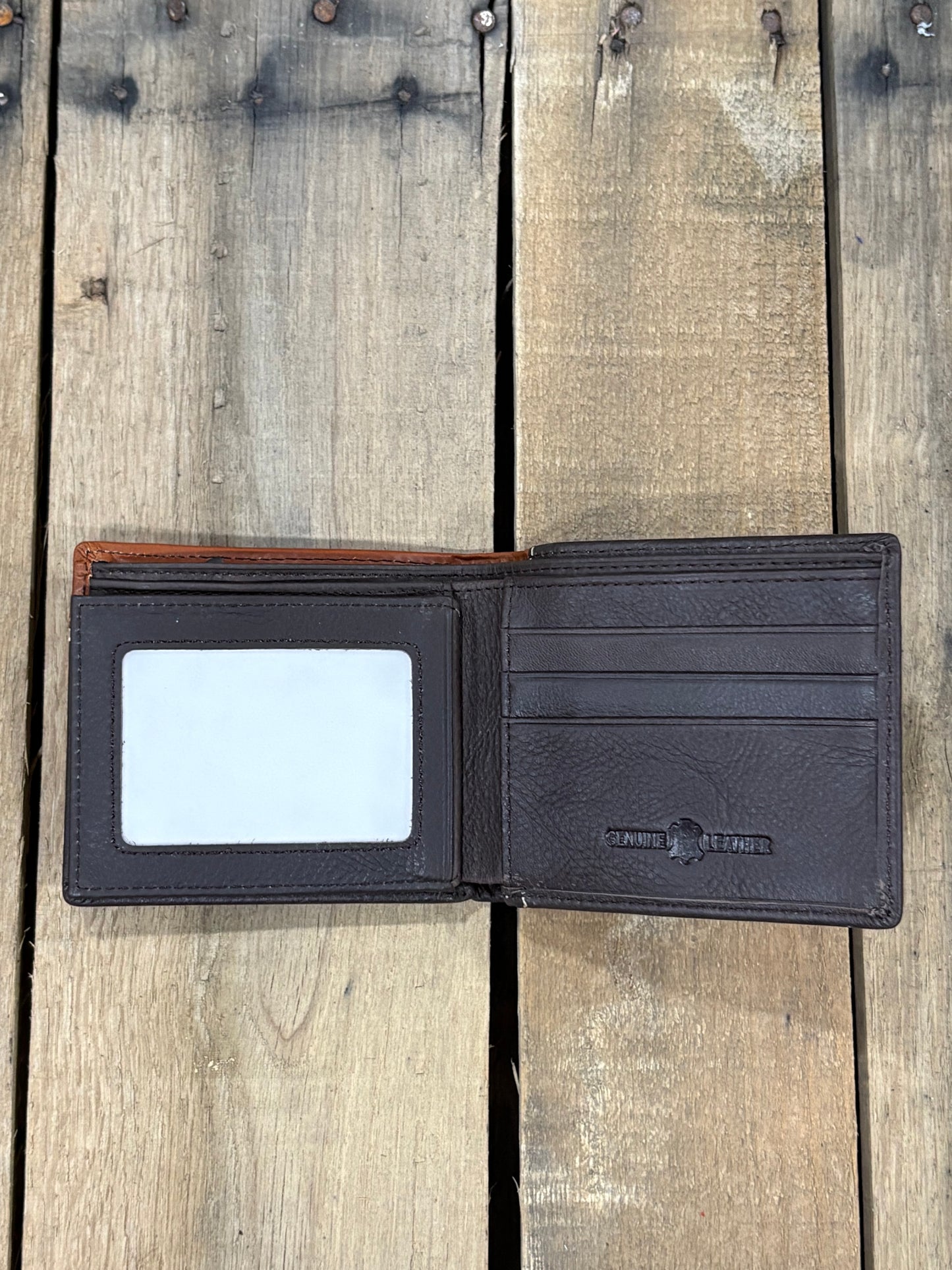 Coffee Brown leather wallet with a ID window slot and 3 card slots on a wooden surface