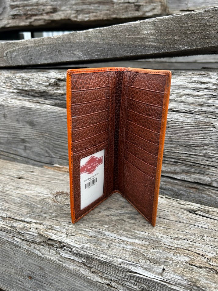 Brown leather wallet open on a wooden surface