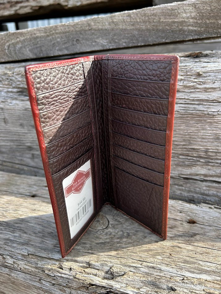 Coffee Brown leather wallet with brand label on a wooden surface