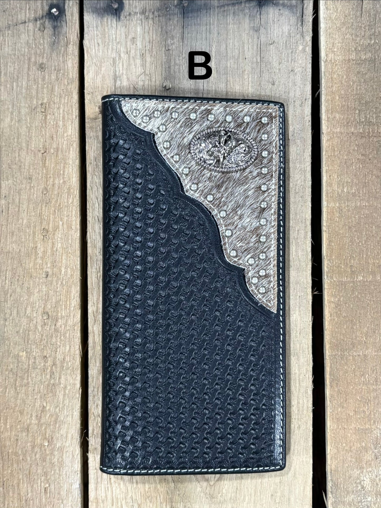 Black basketweave leather Tall wallet with a Bull Rider Concho on top right corner on top of Hair-On cowhide with Silver studs. Front View 