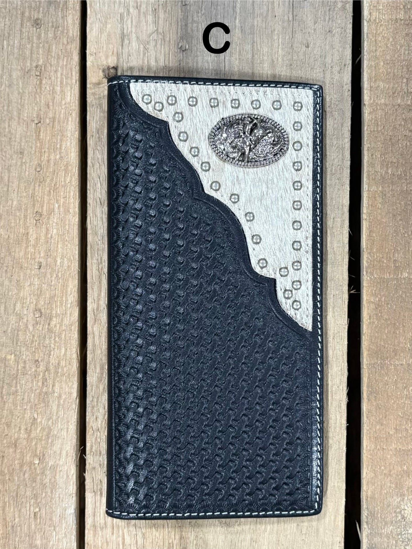 Black basketweave leather Tall wallet with a Bull Rider Concho on top right corner on top of Hair-On cowhide with Silver studs. Front View 