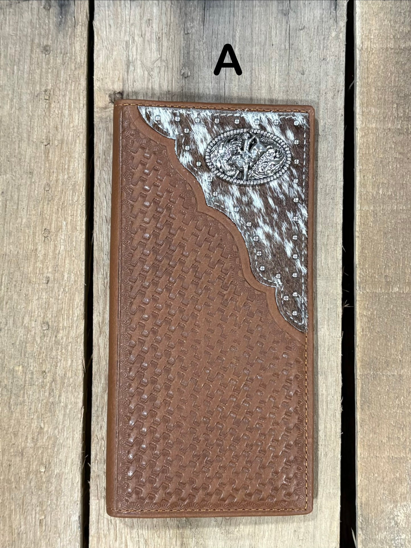 Brown basketweave leather Tall wallet with a Bull Rider Concho on top right corner on top of Hair-On cowhide with Silver studs. Front View 