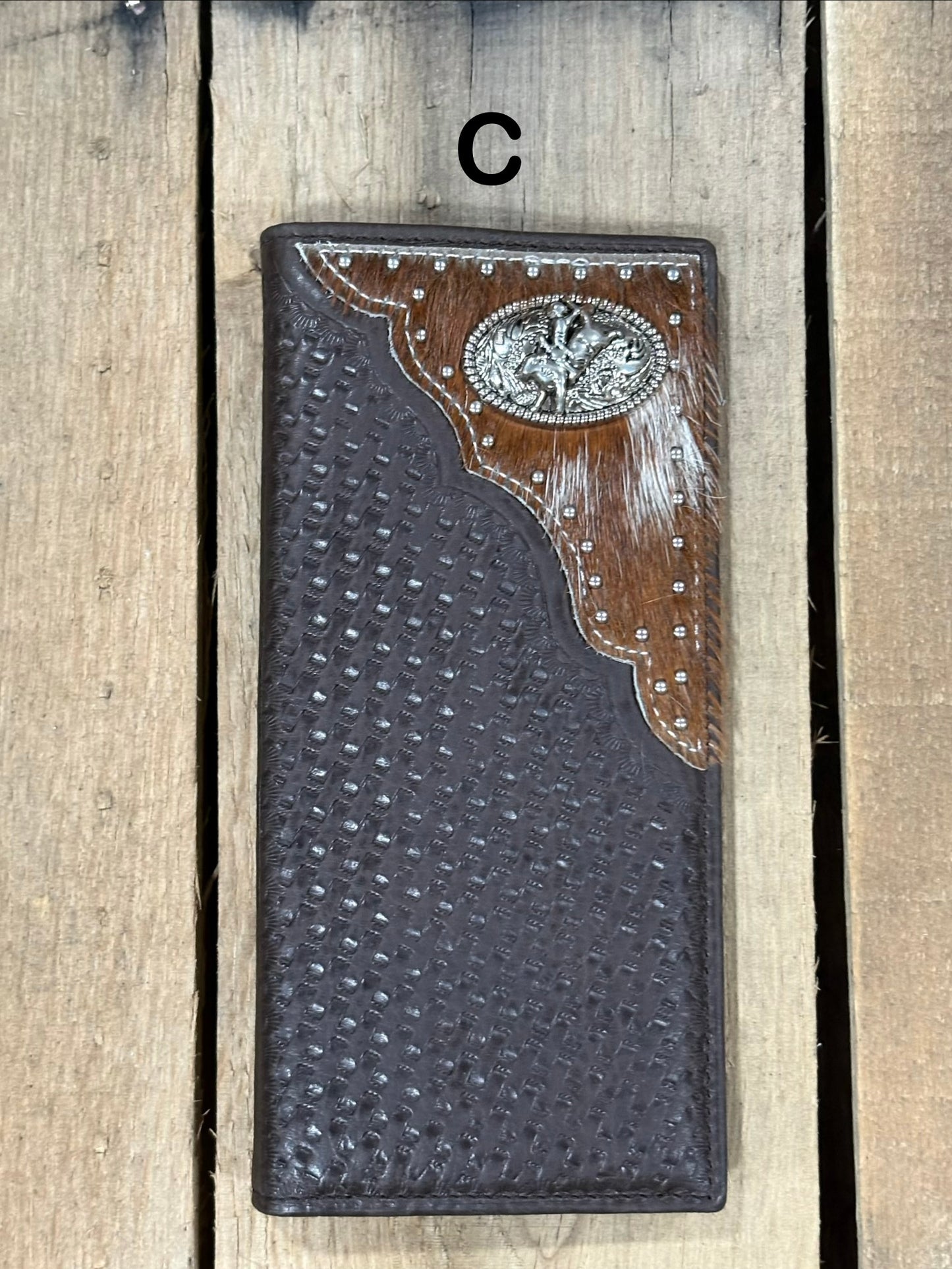 Coffee Brown basketweave leather Tall wallet with a Bull Rider Concho on top right corner on top of Hair-On cowhide with Silver studs. Front View 