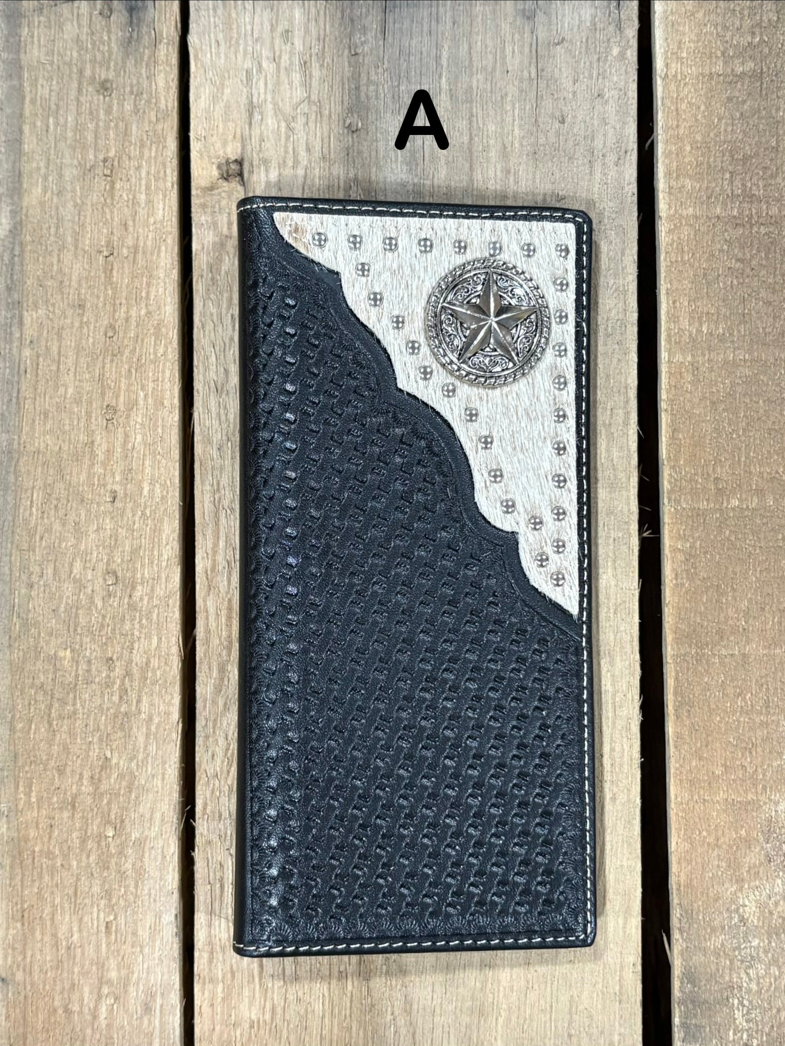 Black basketweave leather Tall wallet with a Star Concho on top right corner on top of Hair-On cowhide with Silver studs. Front View 