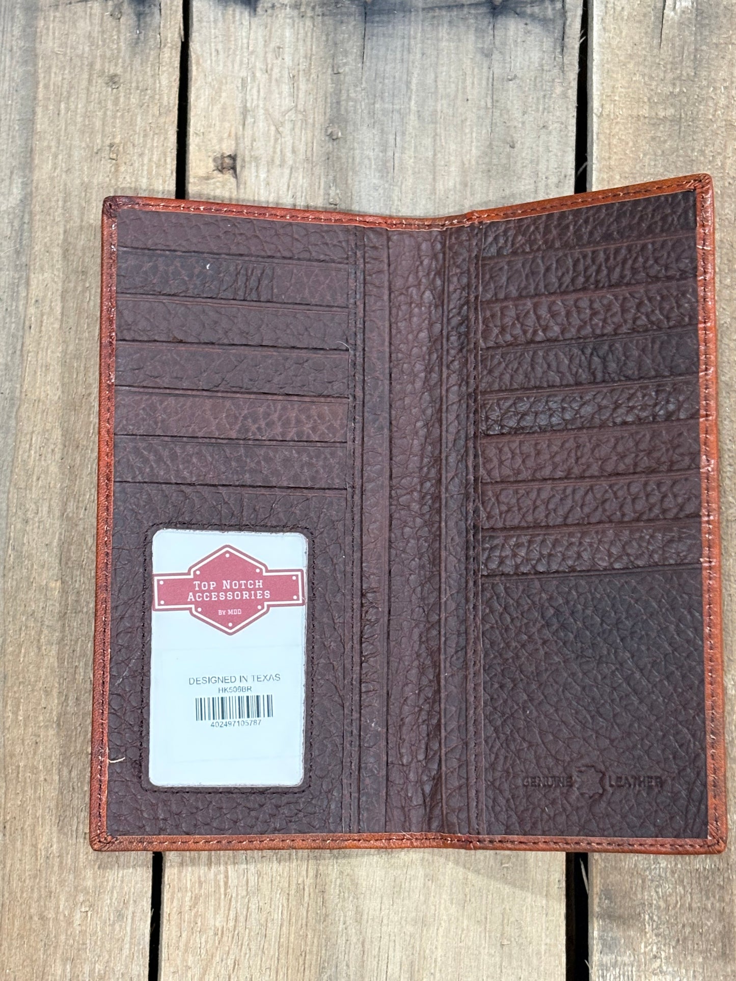 Brown basketweave leather tall wallet with a cowhide inlay corner featuring a Star concho. Inside view showing multiple card slots and a ID window. 