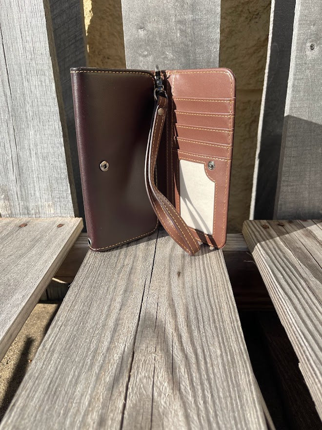 Coffee Brown leather phone case wallet with turquoise inlay and a wristlet strap.  Inside view showing multiple card slots and a ID window. 