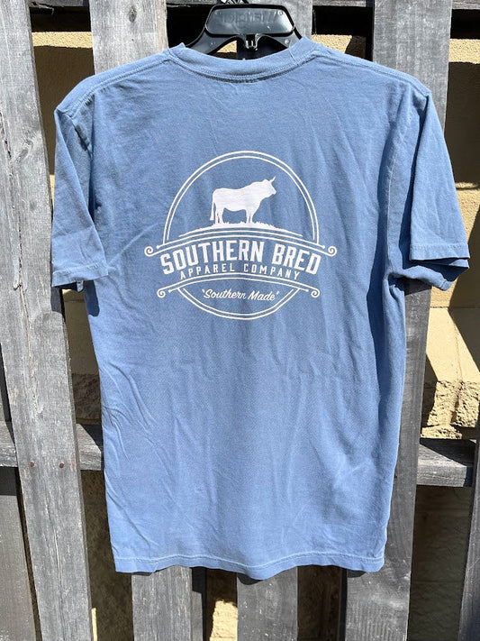 Blue Jean t-shirt with 'Southern Bred Apparel Company' White logo on a wooden background